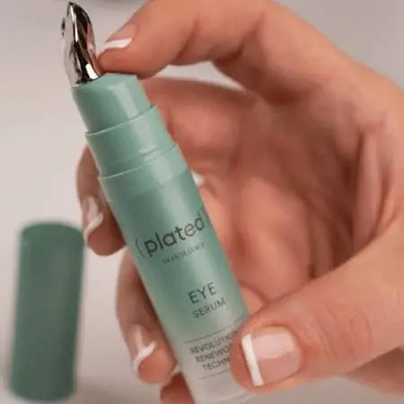Plated Eye Serum Bottle with hand