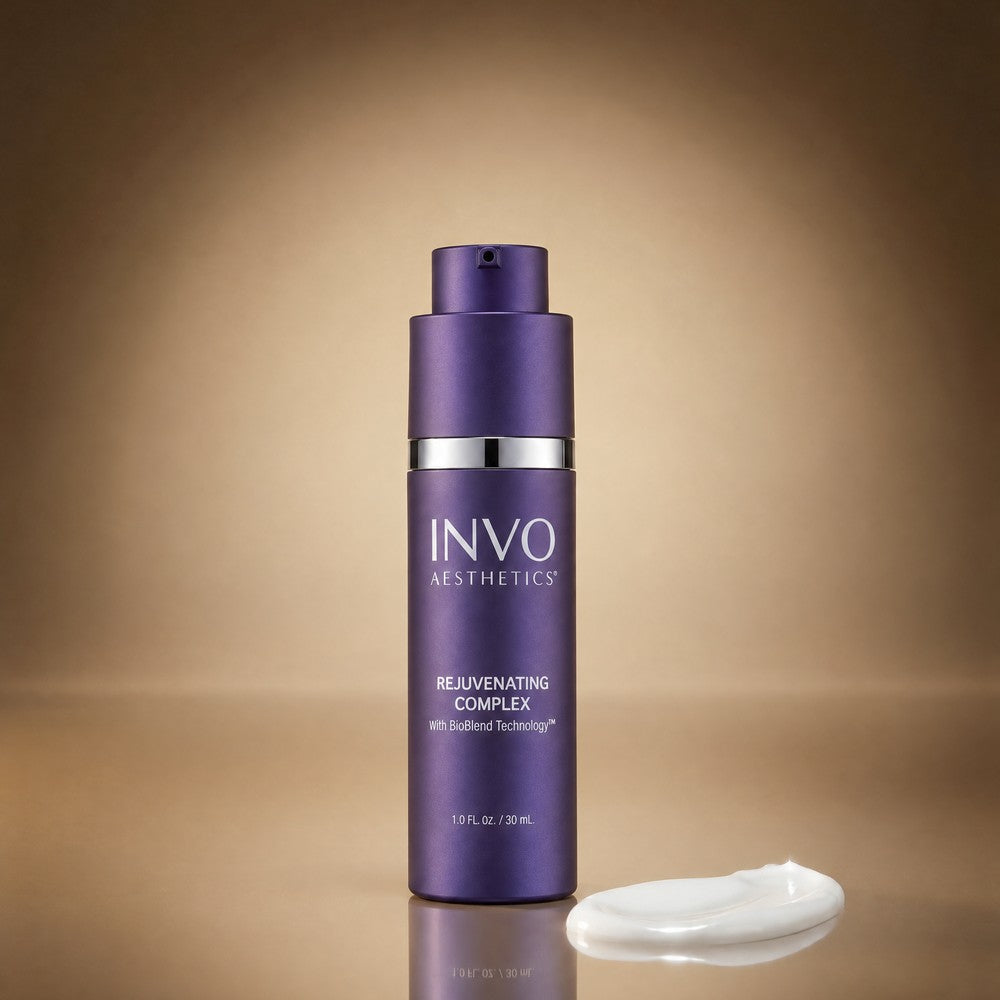 INVO Rejuvenating Complex exosome serum, 30 mL bottle beside a swatch of the serum